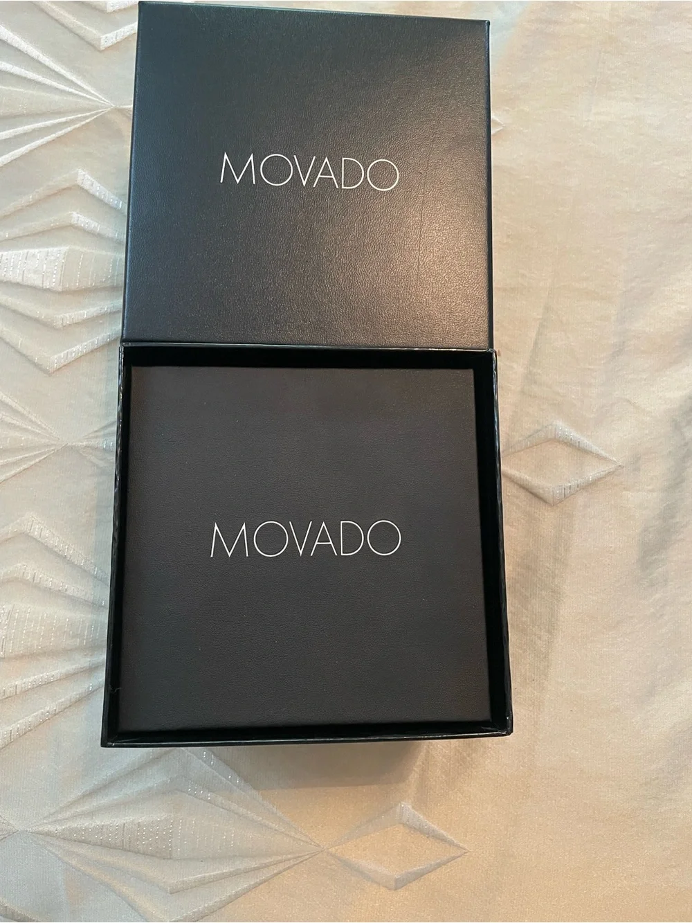 Movado Black Dial Silver Case Black Leather Strap Watch
